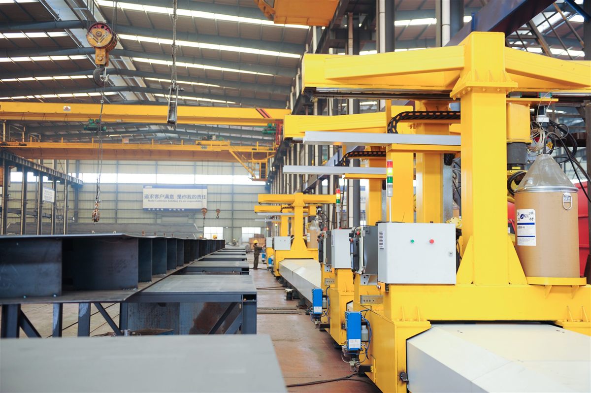 Robotic welding station for double-girder crane beams