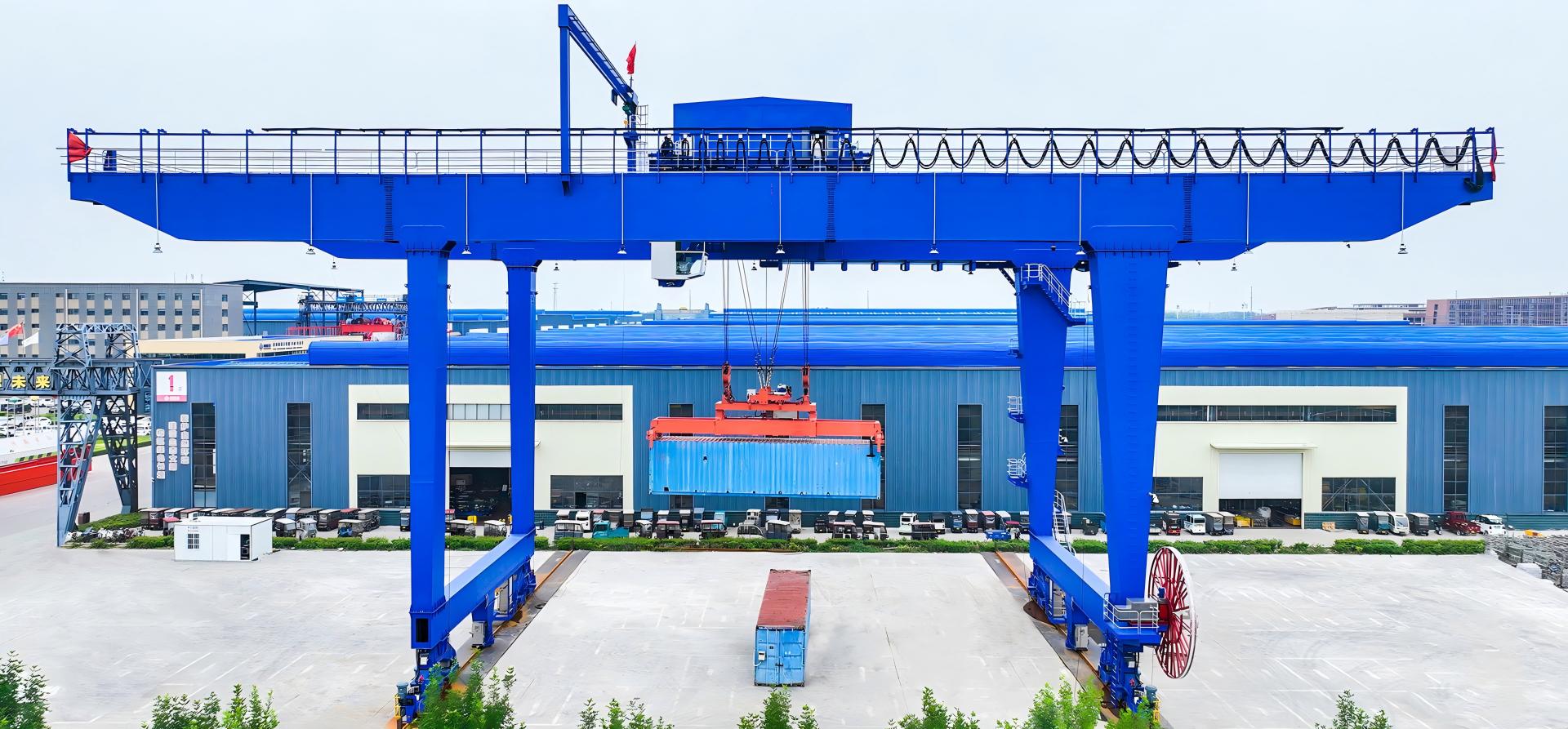 Henan Mine Crane rail-mounted container gantry crane lifting a container in an outdoor yard