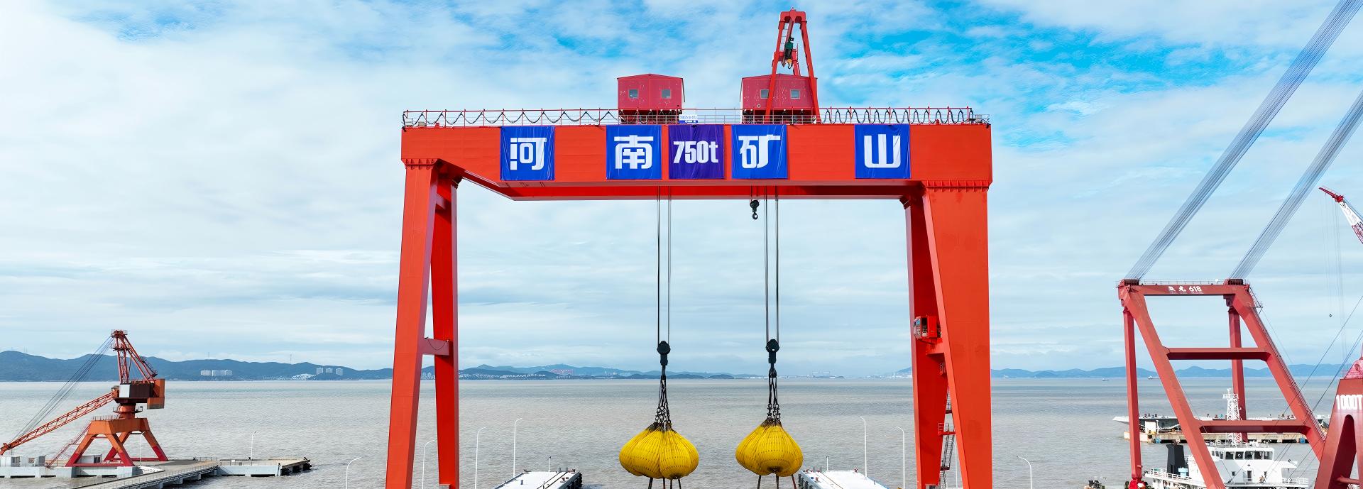 Heavy gantry crane at an outdoor fabrication and assembly site