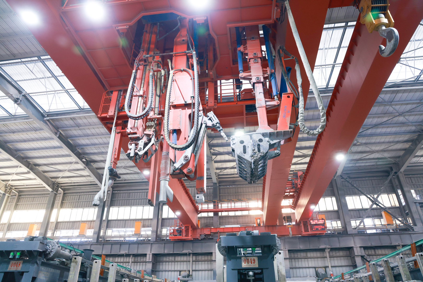 Aluminum smelter process crane with suspended handling tools
