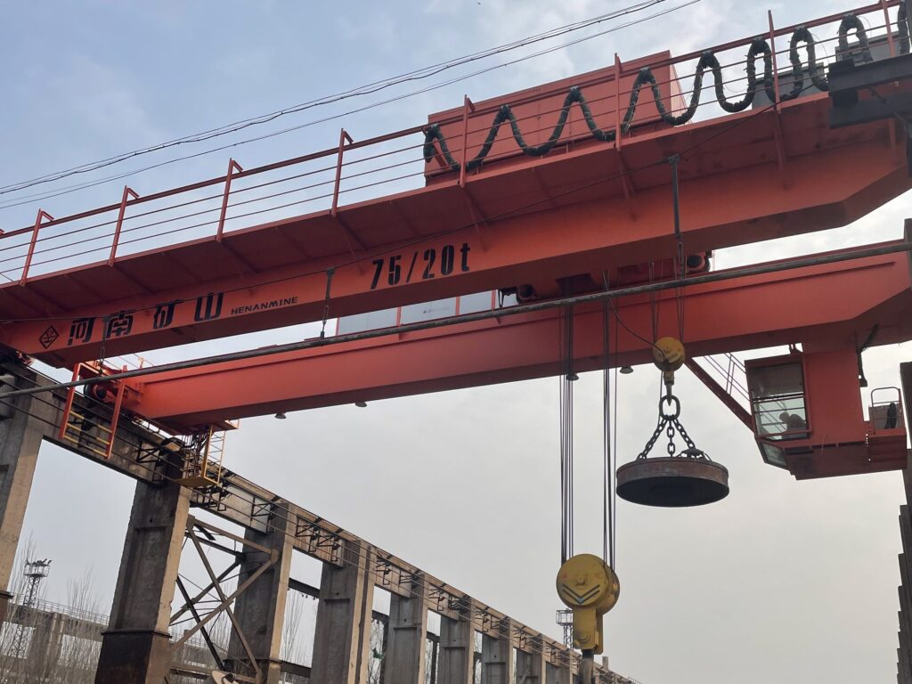 Grab and electromagnetic double-girder overhead crane by Henan Mine Crane