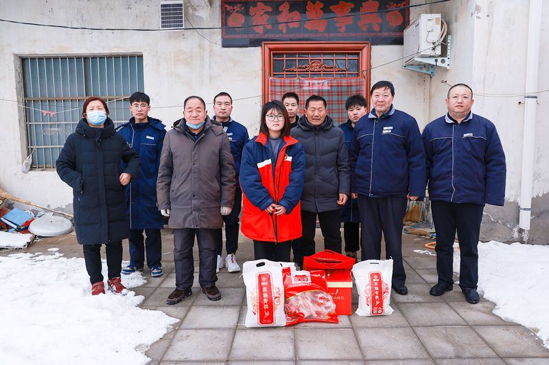 Company representatives delivering February 2024 community assistance