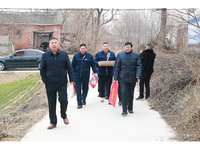 Company representatives delivering seasonal support to neighbouring villages