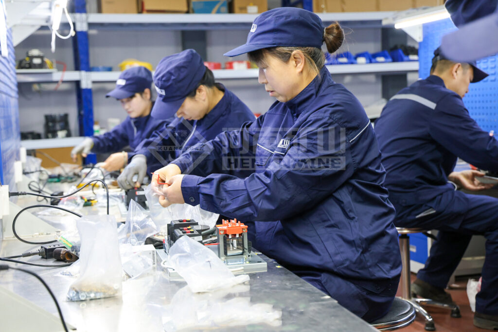 Electrical Assembly Competition Reinforces Crane Control Build Quality — image 3 Electrical assembly skills competition during the factory quality programme