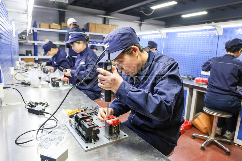 Electrical Assembly Competition Reinforces Crane Control Build Quality — image 6 Electrical assembly skills competition during the factory quality programme