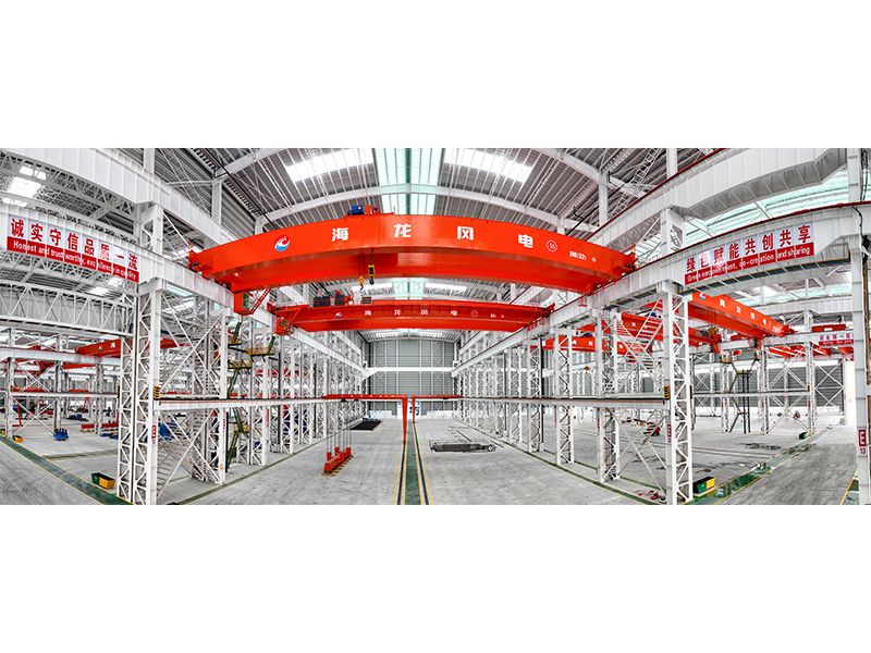 Quality team reviewing crane performance with customers at their facilities