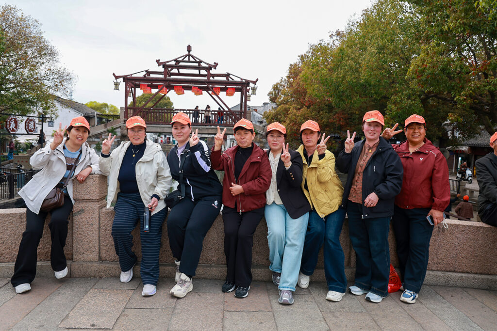 Employee parents on the Suzhou stage of the company travel programme