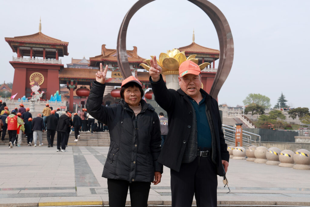 Employee parents at the Xuzhou opening stage of their travel programme
