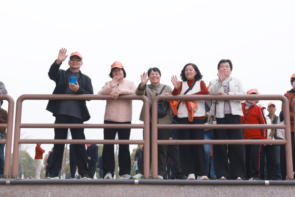 Employee parents at the Xuzhou opening stage of their travel programme