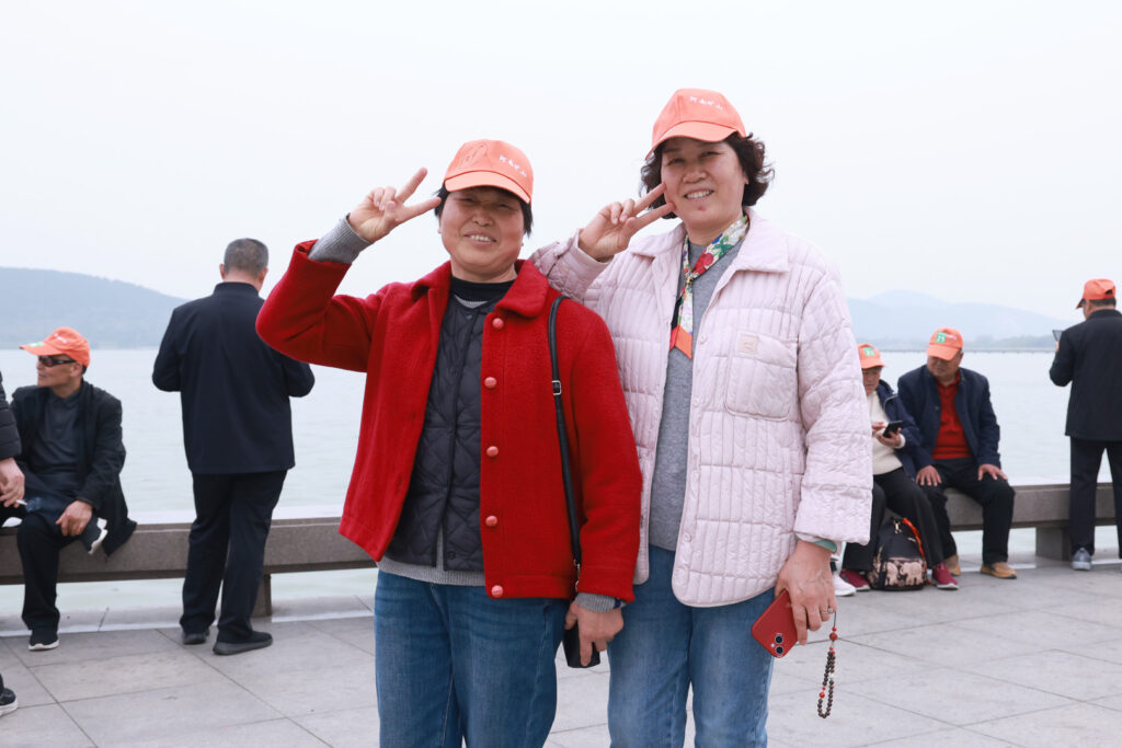Employee parents at the Xuzhou opening stage of their travel programme