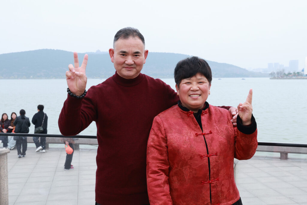 Employee parents at the Xuzhou opening stage of their travel programme