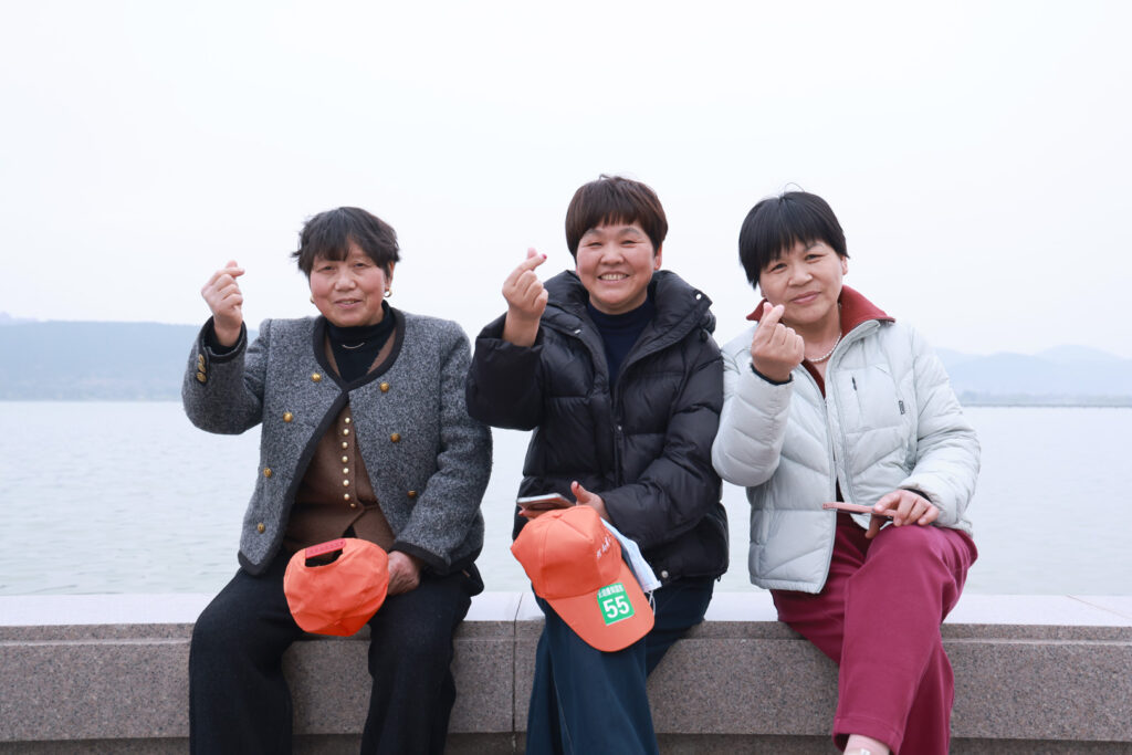 Employee parents at the Xuzhou opening stage of their travel programme
