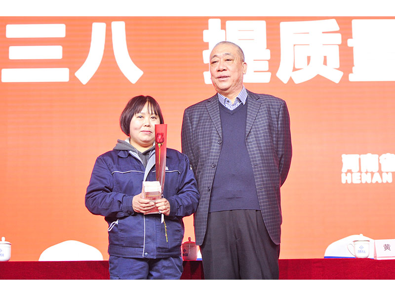 Electric-hoist quality inspector Xiao Qiancui checking equipment records