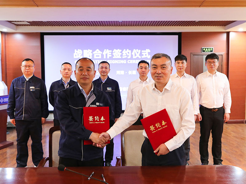 Henan Mine and NGC representatives signing the April 2022 agreement