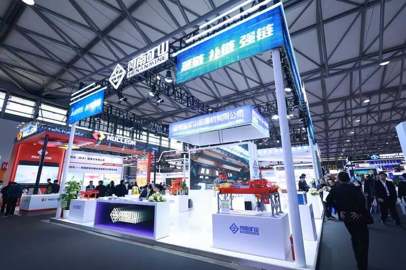 Shanghai Exhibition Displays Automated Industrial Handling Equipment — image 2 Automated industrial crane displays at the Shanghai heavy machinery exhibition