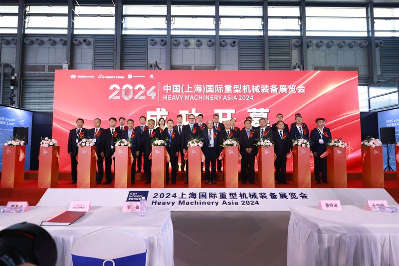 Shanghai Exhibition Displays Automated Industrial Handling Equipment — image 3 Automated industrial crane displays at the Shanghai heavy machinery exhibition