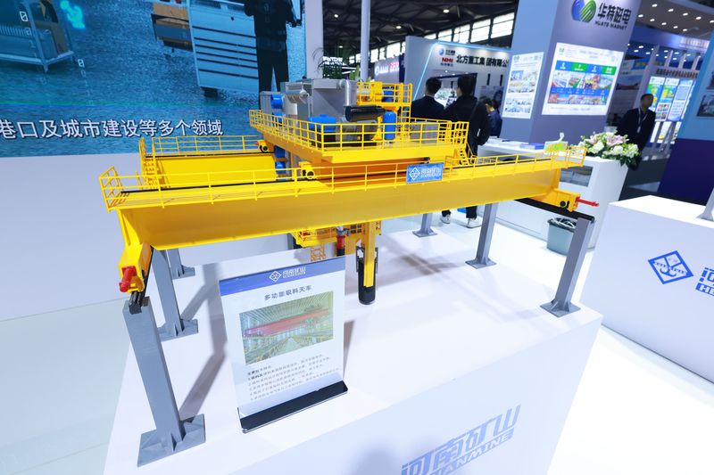 Shanghai Exhibition Displays Automated Industrial Handling Equipment — image 6 Automated industrial crane displays at the Shanghai heavy machinery exhibition