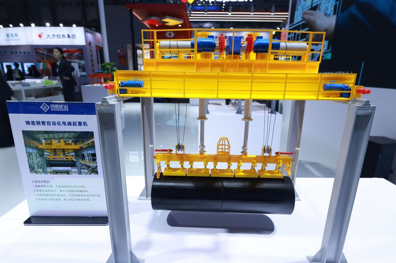 Shanghai Exhibition Displays Automated Industrial Handling Equipment — image 7 Automated industrial crane displays at the Shanghai heavy machinery exhibition