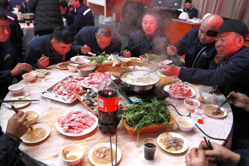 Employees sharing meals during the November 2024 winter programme
