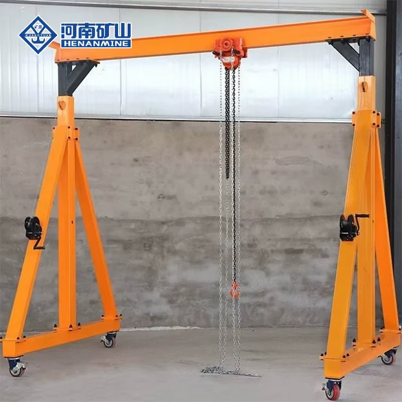 Freestanding orange portable gantry frame with chain hoist and four caster wheels