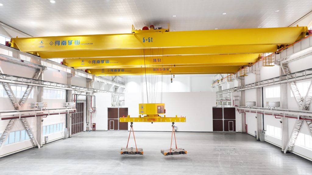 Rotating-beam overhead crane for aerospace component handling