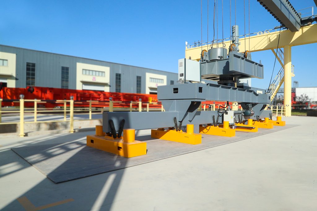 Gantry crane and lifting attachment for automated steel plate storage