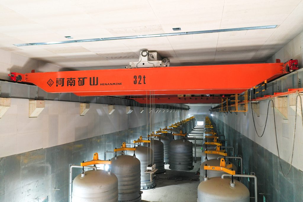 Overhead crane installed in a photovoltaic polysilicon processing facility
