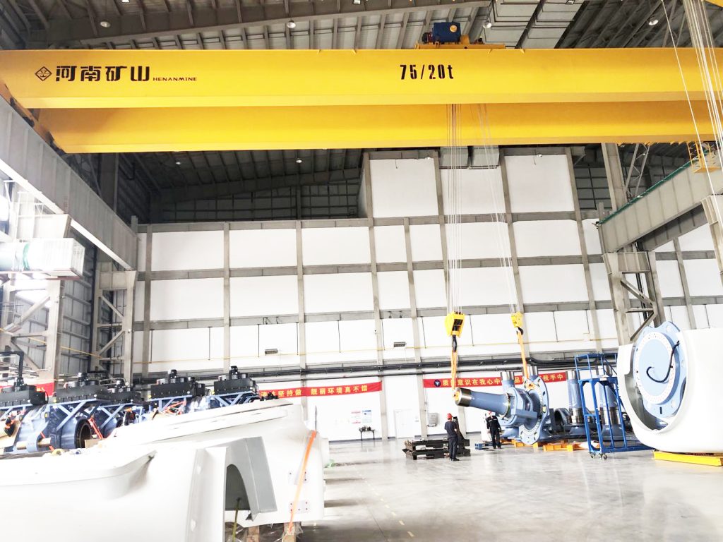 Heavy overhead crane serving a wind turbine nacelle production bay