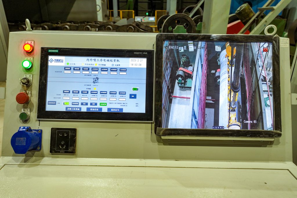 Control panel and camera display for a magnet beam handling crane