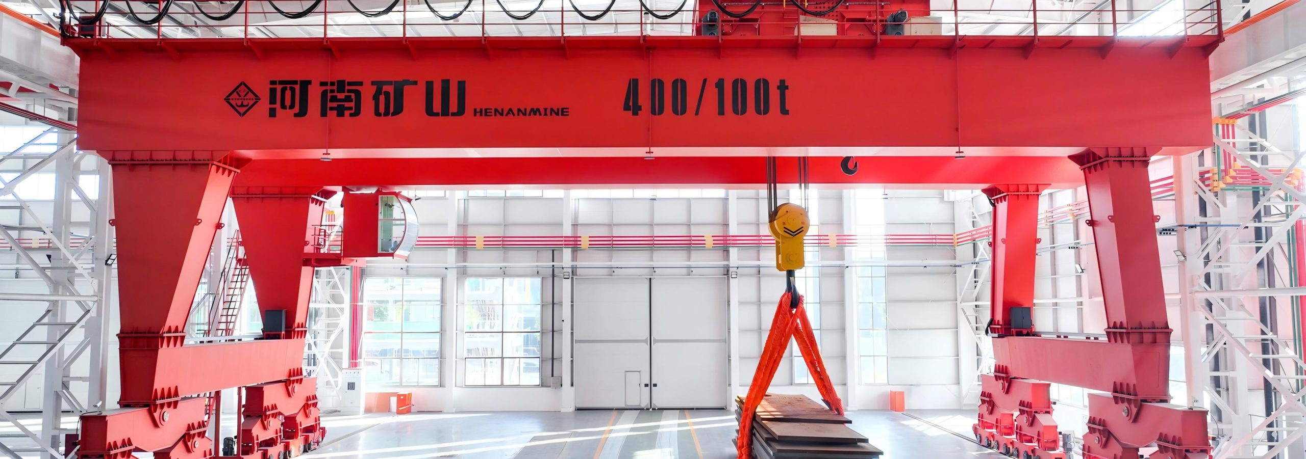 Heavy overhead crane in a chemical equipment fabrication workshop