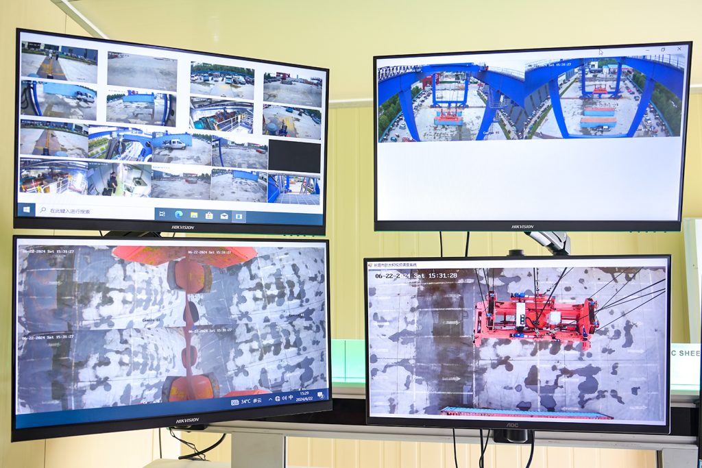 Camera monitoring screens for an automated container gantry crane