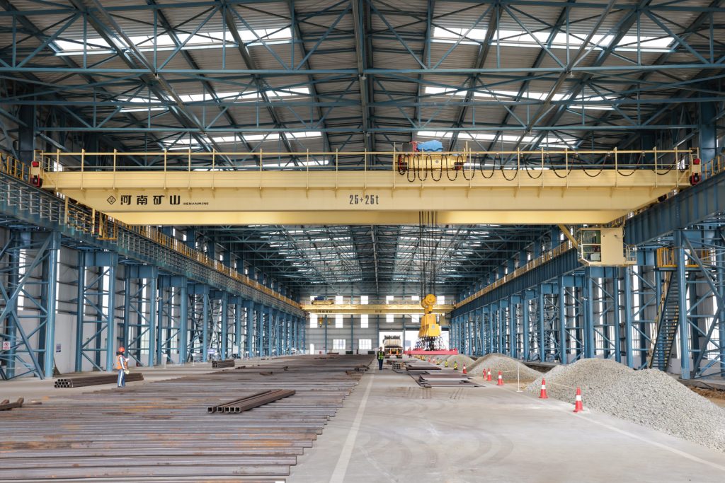 Slab clamp overhead crane installed above a steel slab handling bay