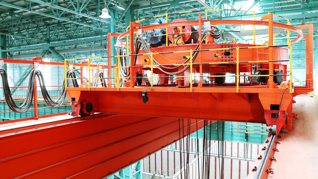 Close-up of crane trolley machinery and maintenance platform